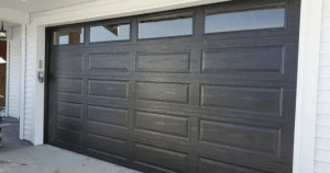 black garage doors with windows