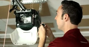 person working on garage door